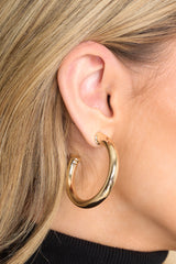 These gold hoops feature a gold finish and a secure post-back closure.