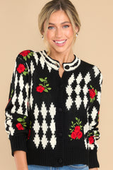 Front view of this cardigan that features a scoop ribbed neckline.