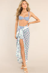This lavender sarong features a geometric pattern, and a silky fabrication.