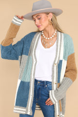 Front view of this cardigan that features functional buttons down the front.