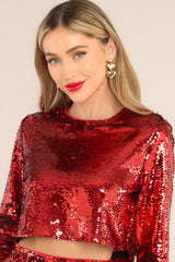 Front view of  this sequin top that features an all over sequin flip design.