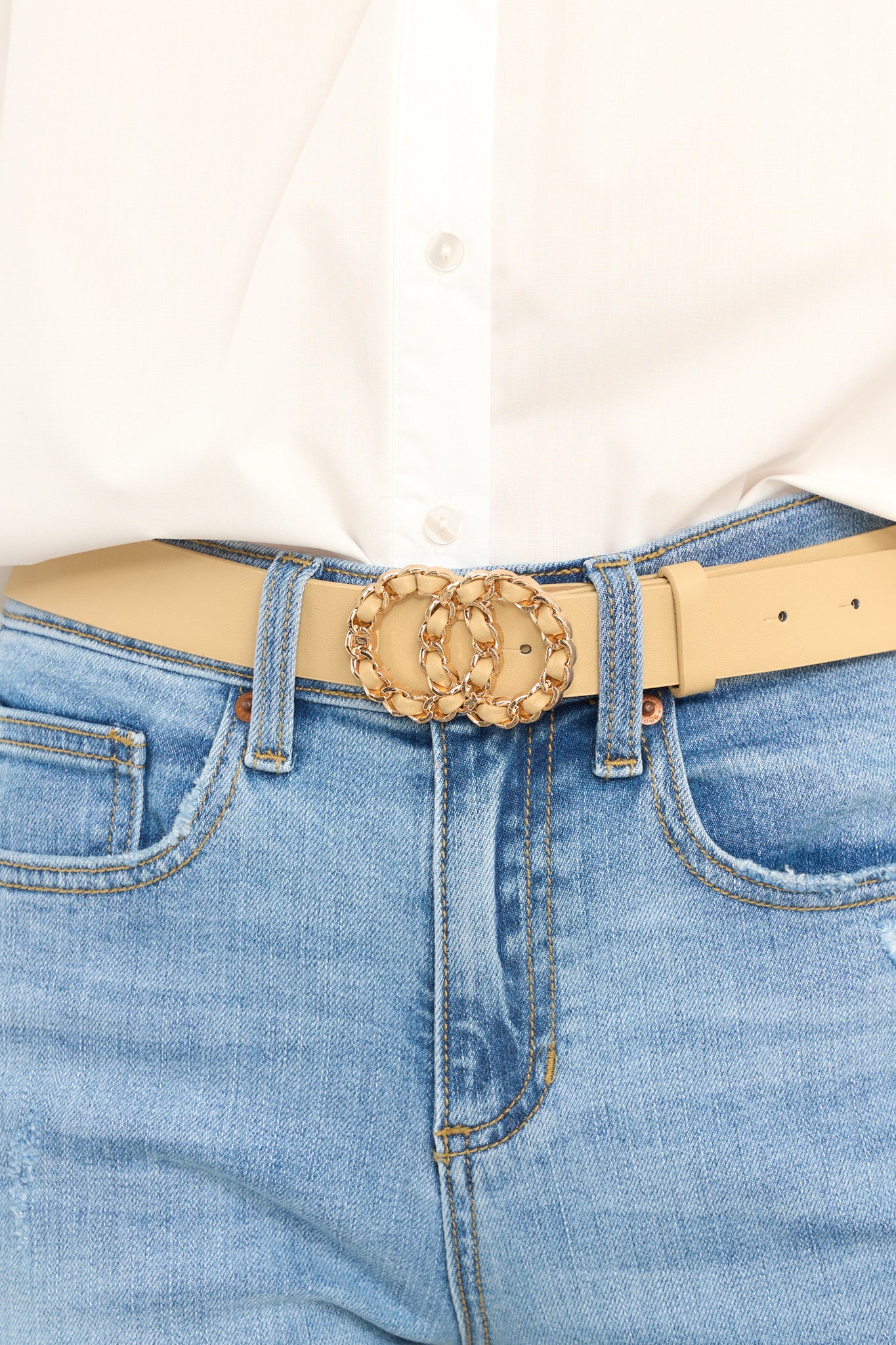 Front view of this belt that features gold hardware, and a double hoop buckle closure.