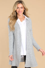 Front view of this diamond ribbed cardigan that features straight sleeves and a straight hemline.