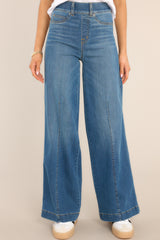 Close-up waist down view of Vintage Indigo Stretch Wide Leg Jeans. 