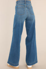 Relaxed back view of Vintage Indigo Stretch Wide Leg Jeans that feature a front seam, faux front pockets, functional back pockets, a slip on design, and belt loops.