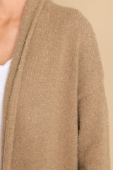 Close up view of this cardigan that features a folded collar.
