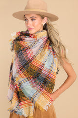 This yellow multi scarf features a plaid pattern throughout with fringe sides.