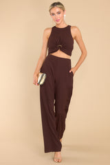 Full body view of these pants that feature a high rise, an elastic waistband, and functional pockets.