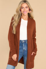 Front view of this cardigan that features front pockets.
