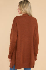 Back view of this cardigan that features front pockets, an oversized cozy fit, and soft knit fabric.