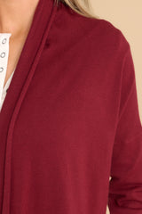 Close up view of this cardigan that features a large slouchy folded collar.