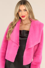 Front view of this jacket that features a folded collar, a super soft faux fur material, and a cropped hemline.
