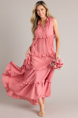 Full body view of this dress that features a ruffled v-neckline with a self-tie closure, a sleeveless design, and a flowy skirt with subtle ruffle detailing throughout.
