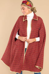 Front view of this cape that features tweed fabric.