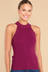 This berry colored tank top features a halter neckline, ribbed stretchy fabric, and a super soft feel.