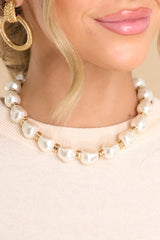 1 The New Classic Gold Pearl Necklace at reddress.com