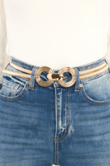This gold belt features a slightly stretchy gold snake chain link design, circle detailing at the center, and a hook closure.