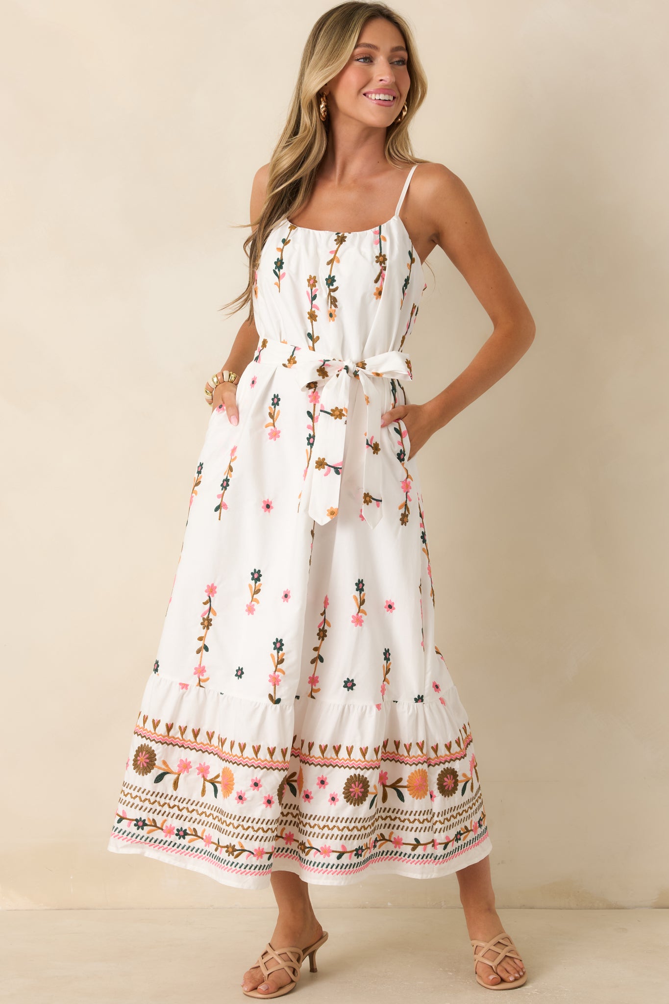 Lightweight cotton blend maxi dress with delicate floral embroidery and a removable self-tie waist belt.