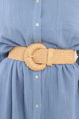 Front view of this belt that features a stretchy elastic band, a belt loop, and a rounded natural buckle. 