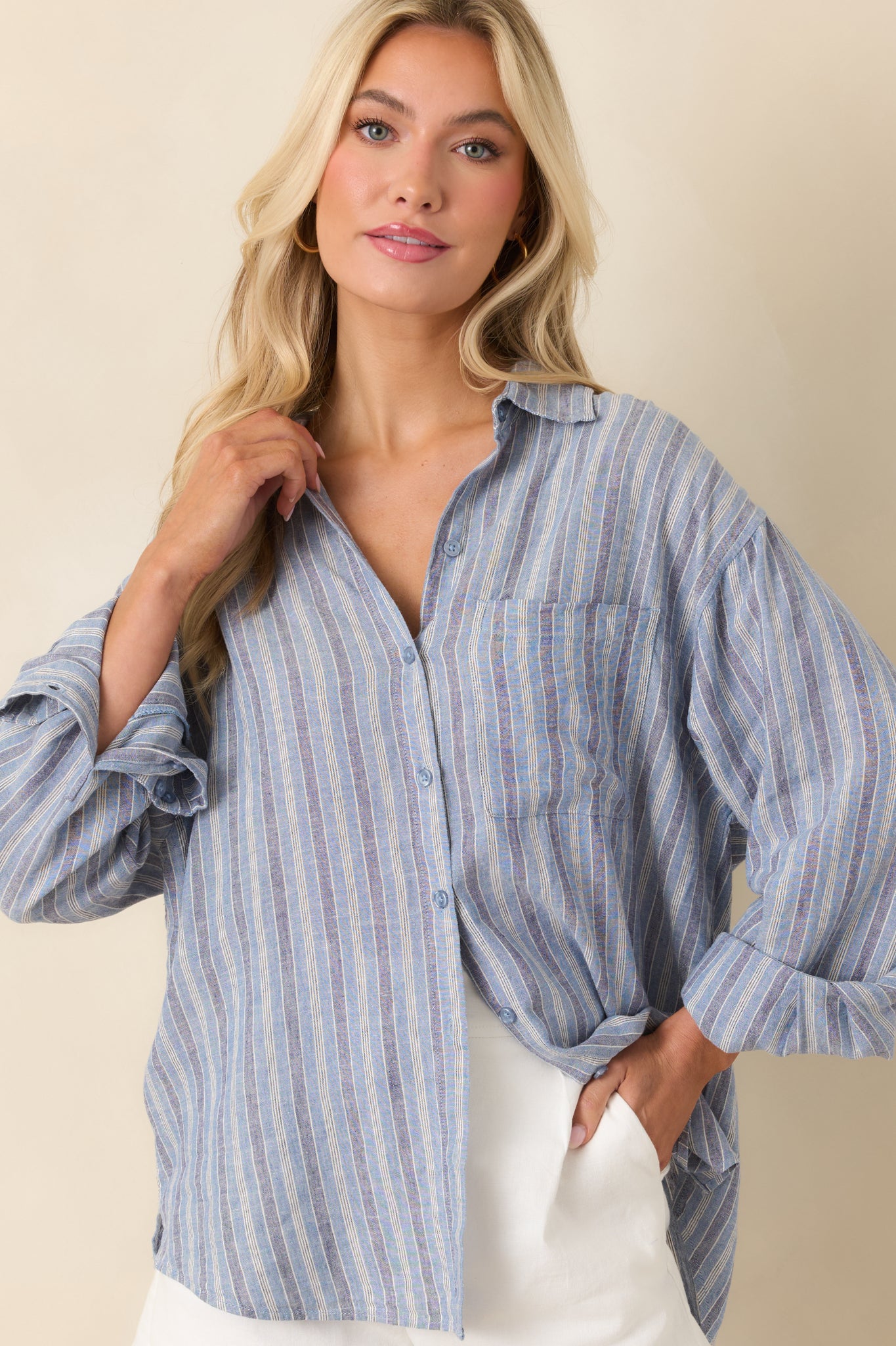 Long sleeve cuff detail with relaxed striped material and easy drape finish.