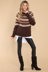 Full body view of this sweater that features a crew neckline, a fun fall design, and ribbed hemline and cuffs. 