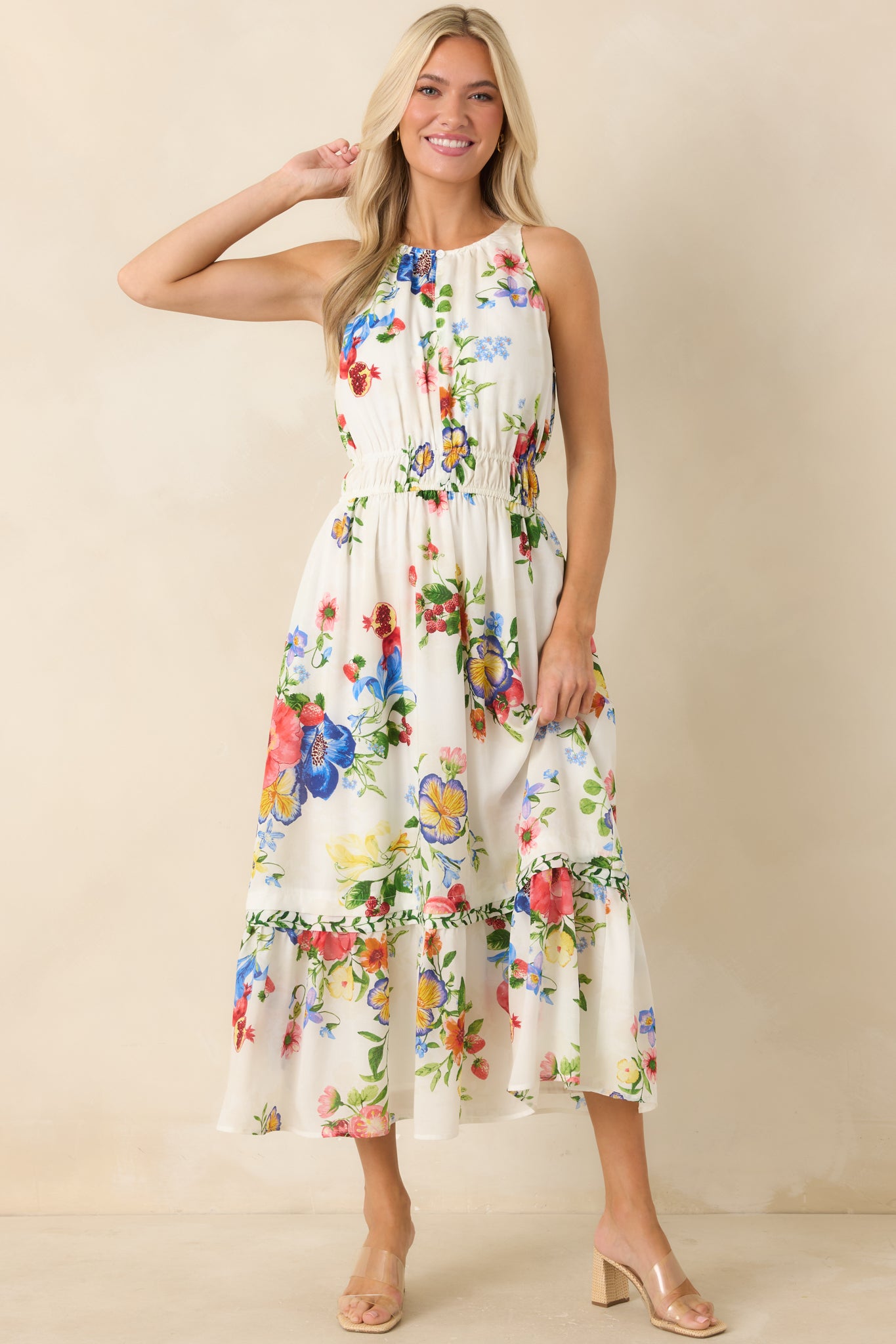 Lightweight floral and fruit print dress with comfortable elastic waist and soft drape.