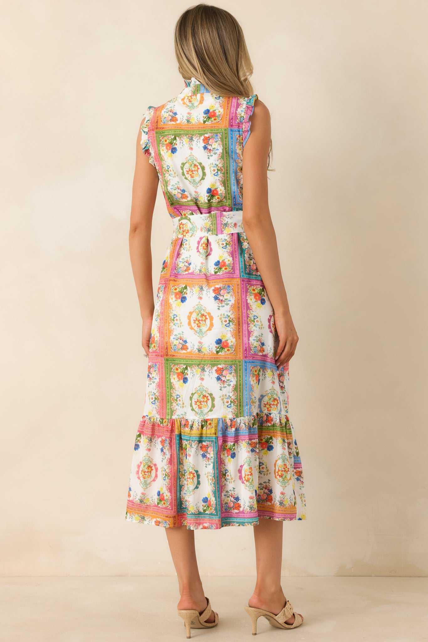Rear view of floral tile print midi dress featuring 100% cotton fabric and clean back silhouette.

