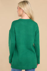 Back view of this sweater that features a relaxed fit.