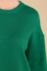 Close up view of this sweater that showcases the soft knit fabric.