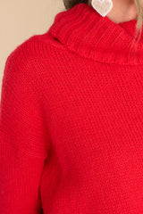 Close up view of this sweater that features a high chunky turtle neck and a super soft fabric.