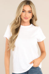 This white top features a high crew neckline, lightweight material, an intentional exposed seam in the back, and short sleeves. 