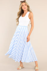 This blue and white skirt features a high waisted design, a functional zipper and hook closure in the back, a diagonal striped pattern, and a flowy fabric.