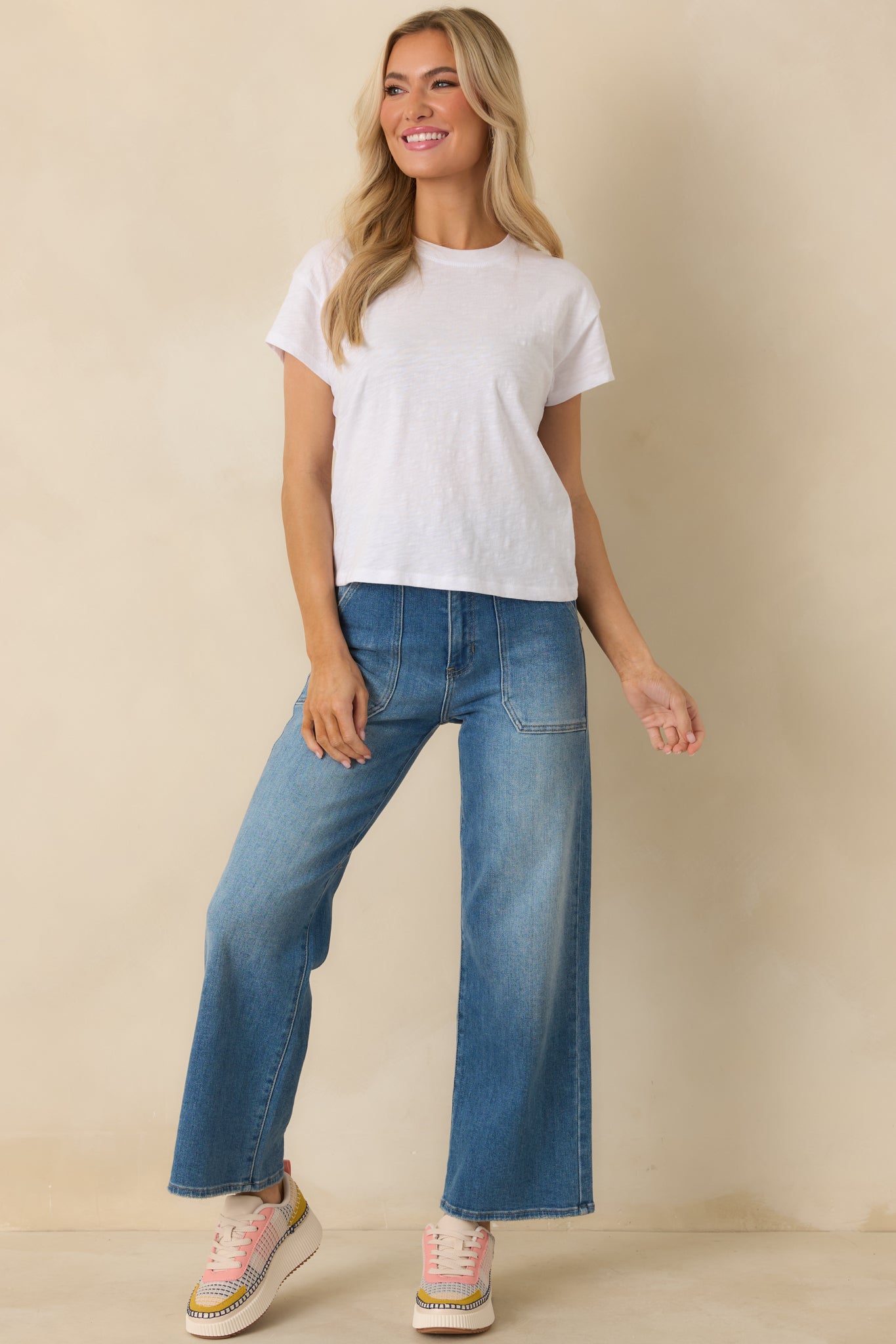 White cotton tee with crew neckline, short sleeves, and regular fit.