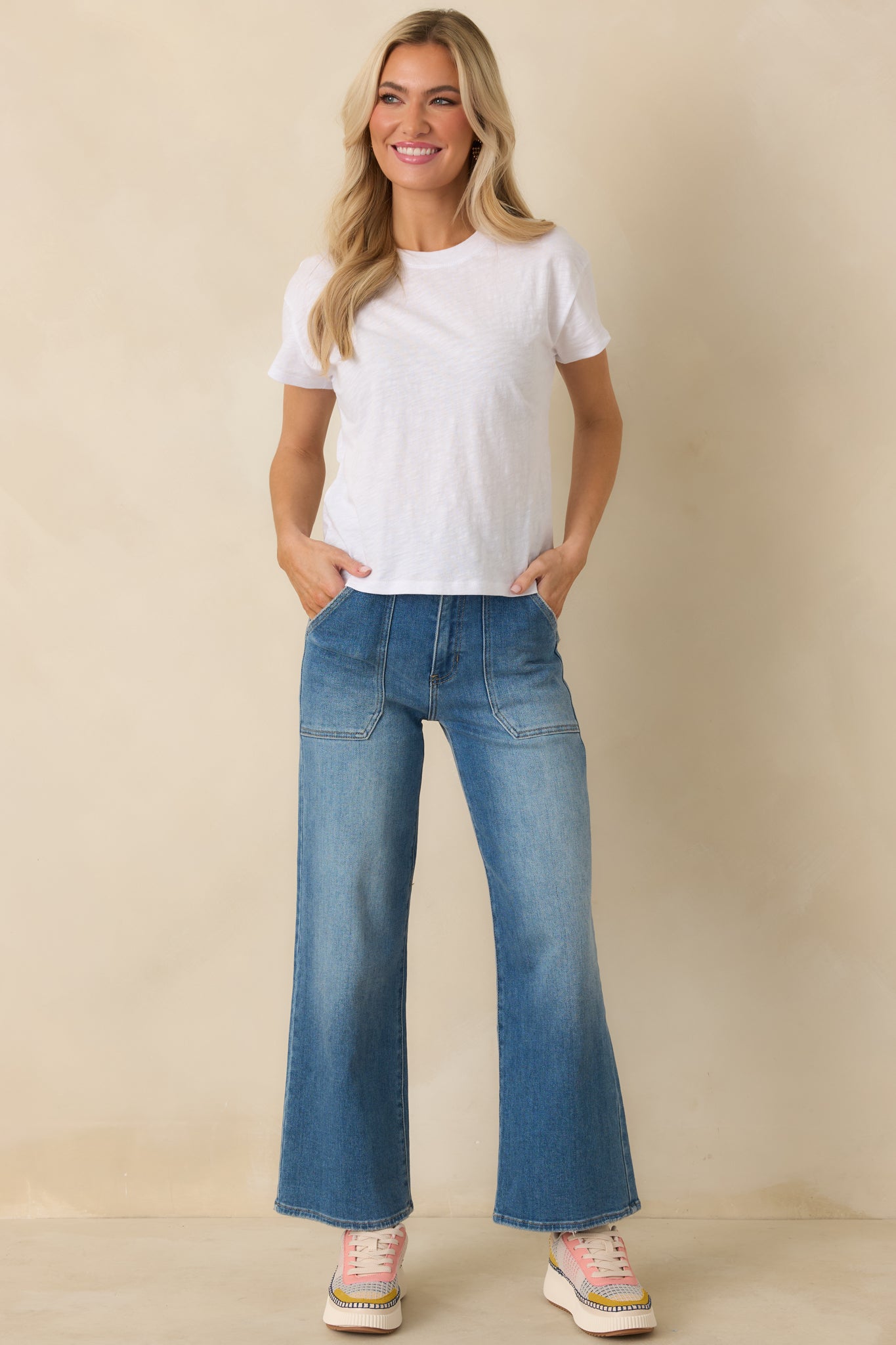White cotton tee with regular silhouette, short sleeves, and smooth jersey fabric.