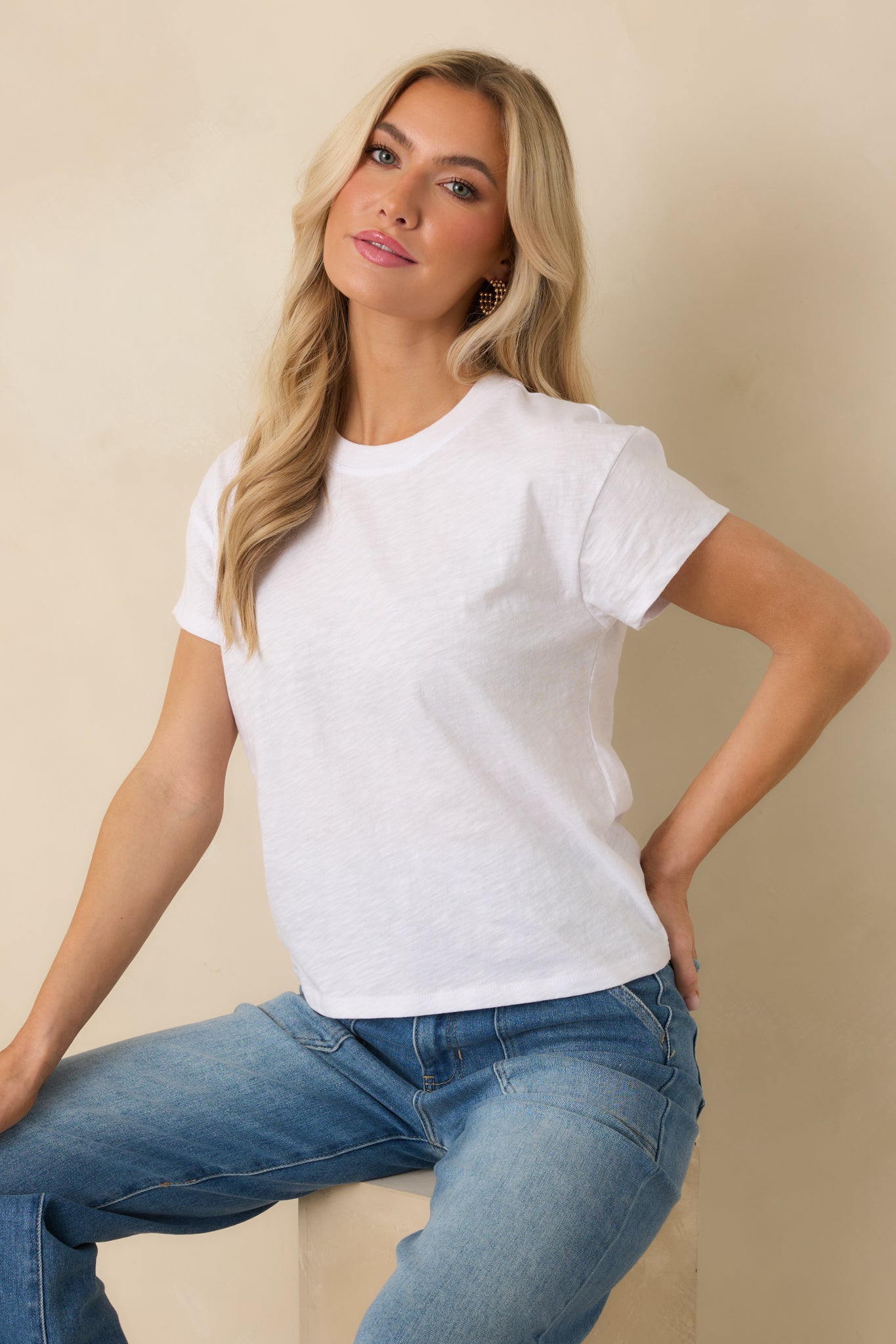 Cropped front view showing crew neckline and soft lightweight cotton material.