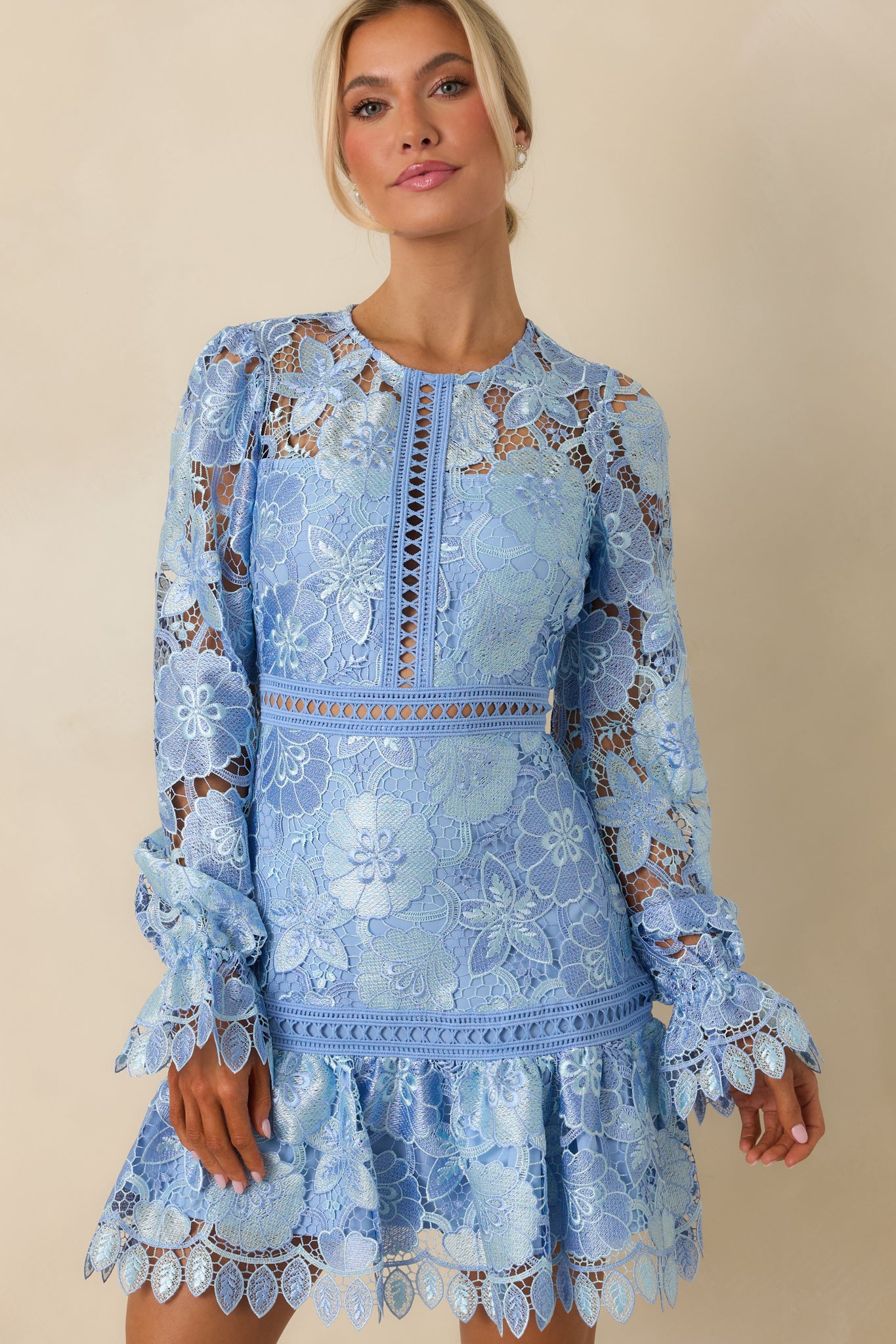 Cropped front view highlighting crew neckline, transparent panel design, and structured single tier.