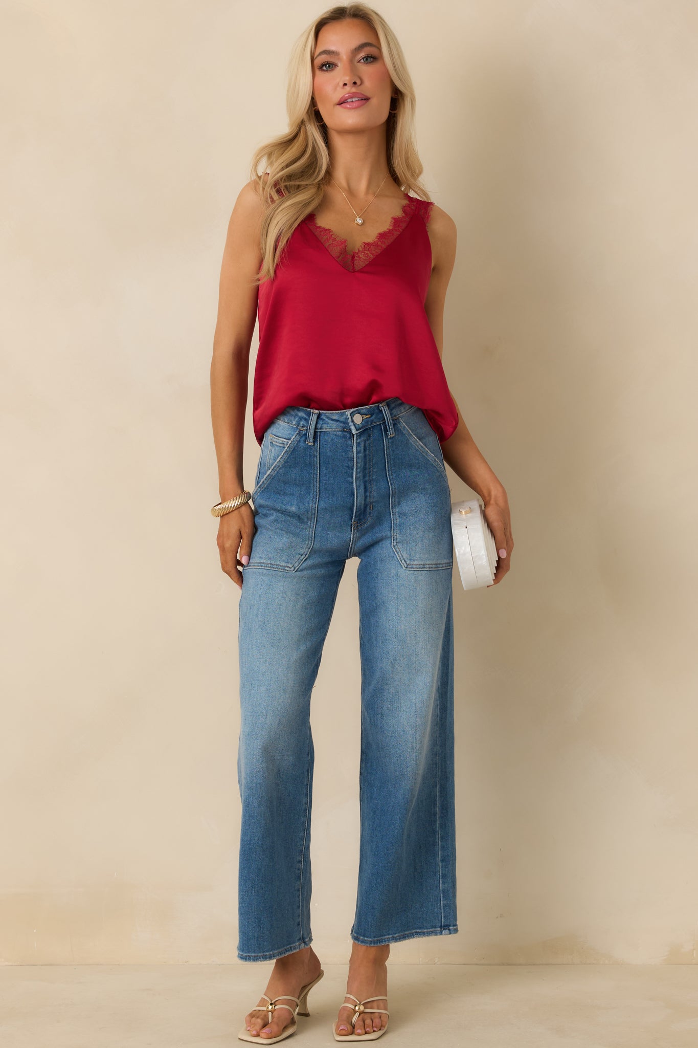 Satin-finish red cami highlighting the relaxed silhouette and smooth drape with a clean, straight hem.