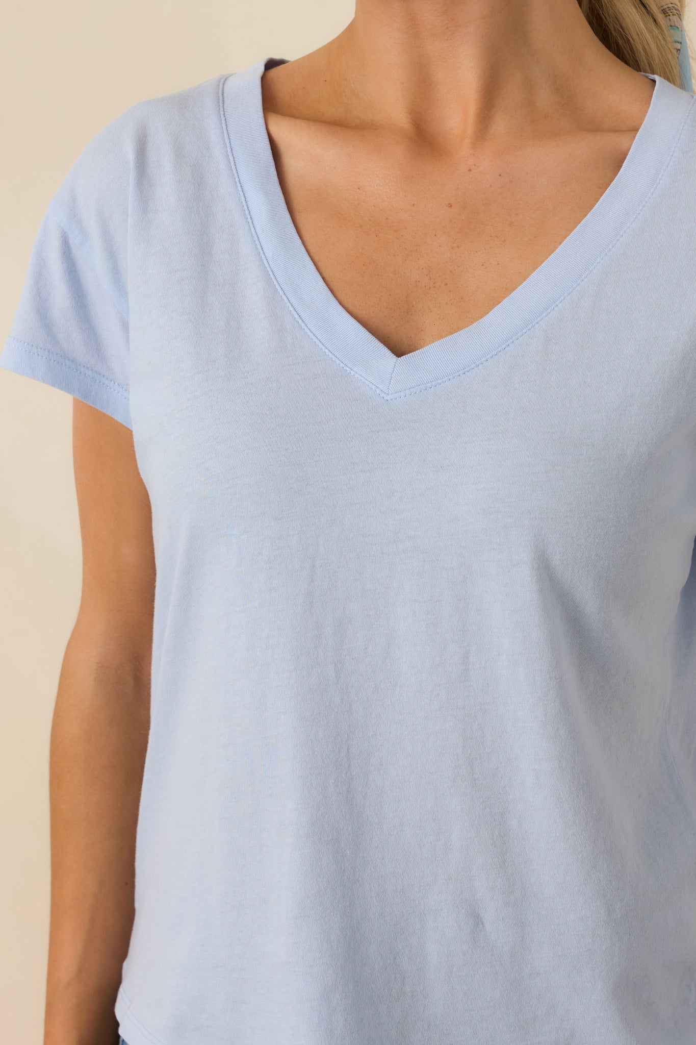 Detailed look at the lightweight cotton jersey blend with a smooth texture and polished finish.