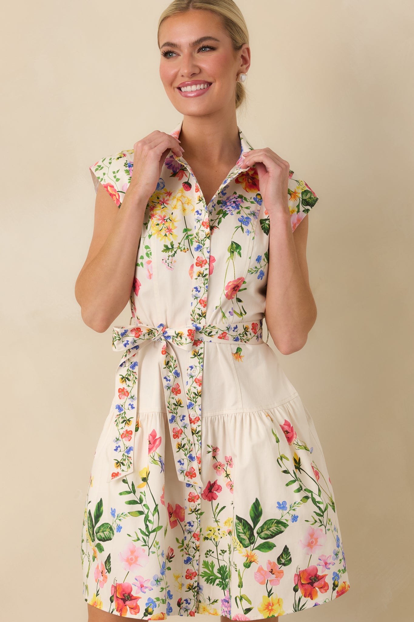 Detailed look at the removable self-tie waist belt and fitted bodice.