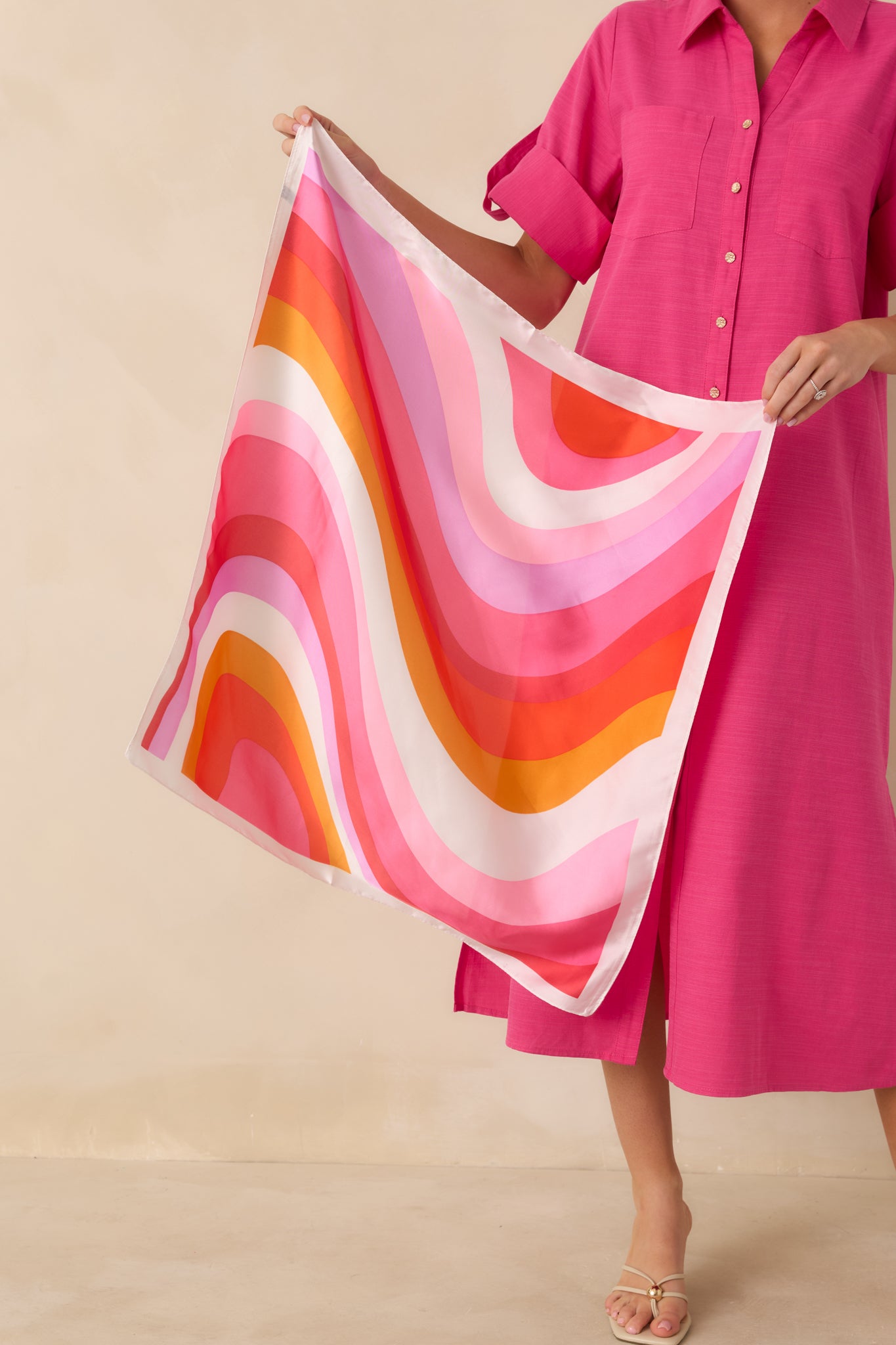 Square pink multi scarf featuring a retro striped design, soft silky hand feel, and neatly finished edges for versatile styling.