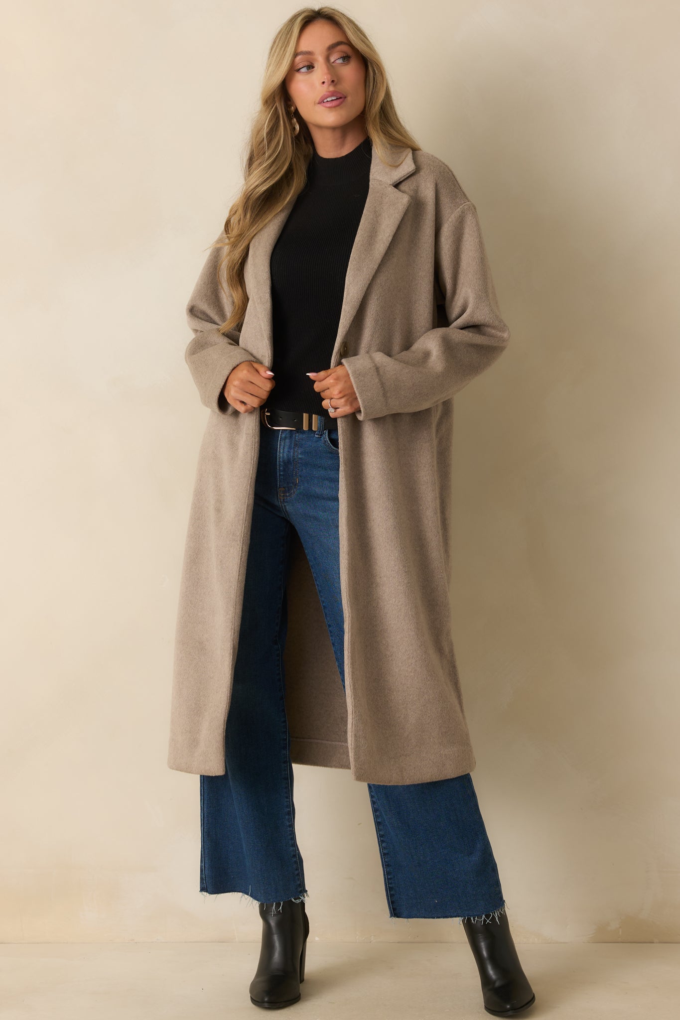 Full body front view showing the coat’s straight fit and elegant taupe color.