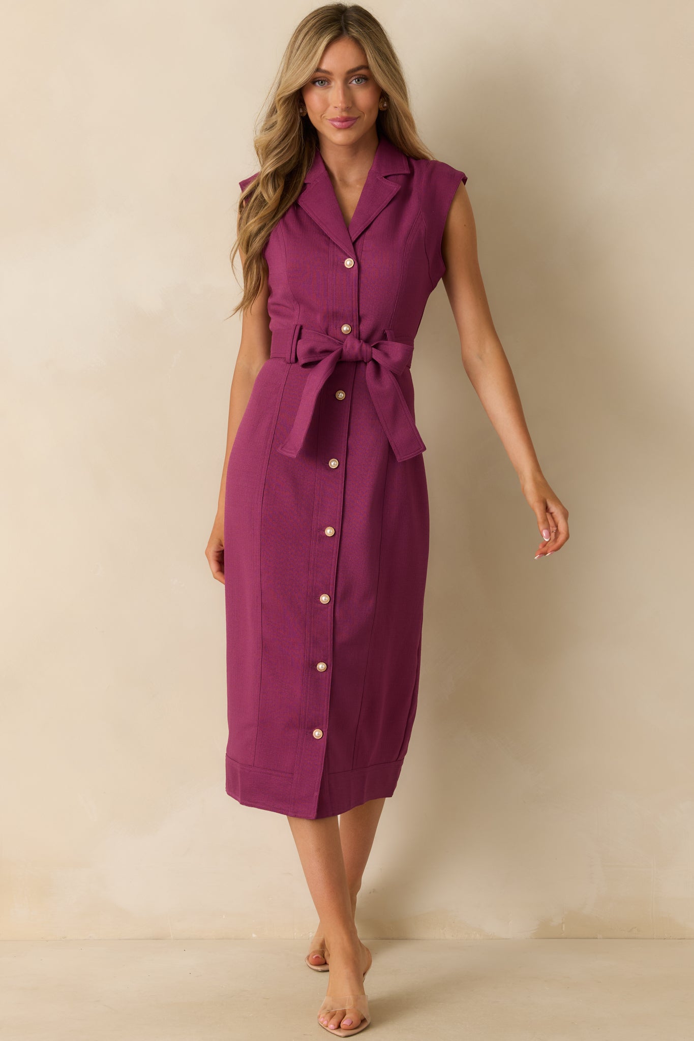 Plum button-front dress styled with its matching self-tie belt cinching the waist.