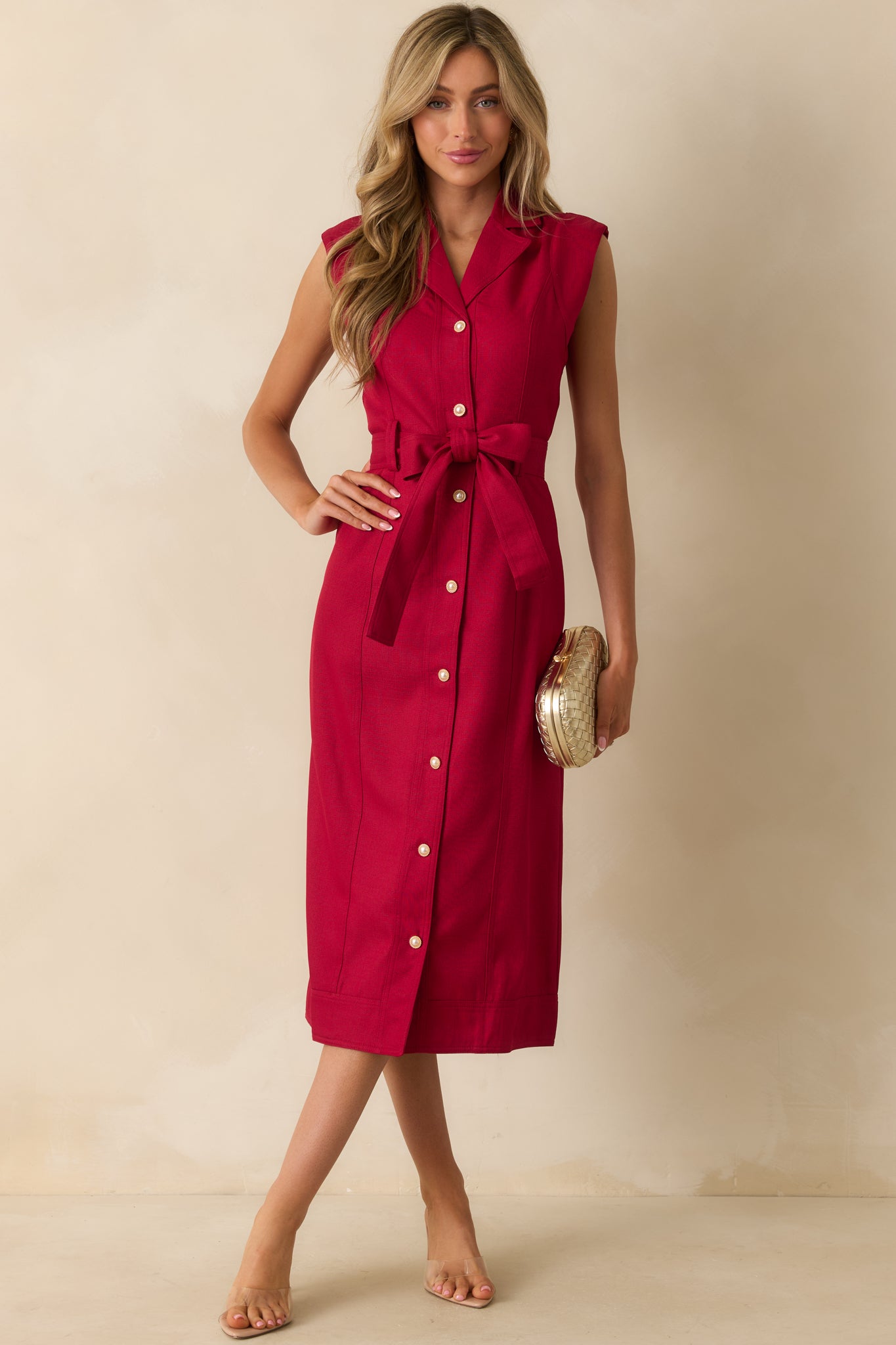 Red wine dress styled with its optional self-tie belt cinching the waist.