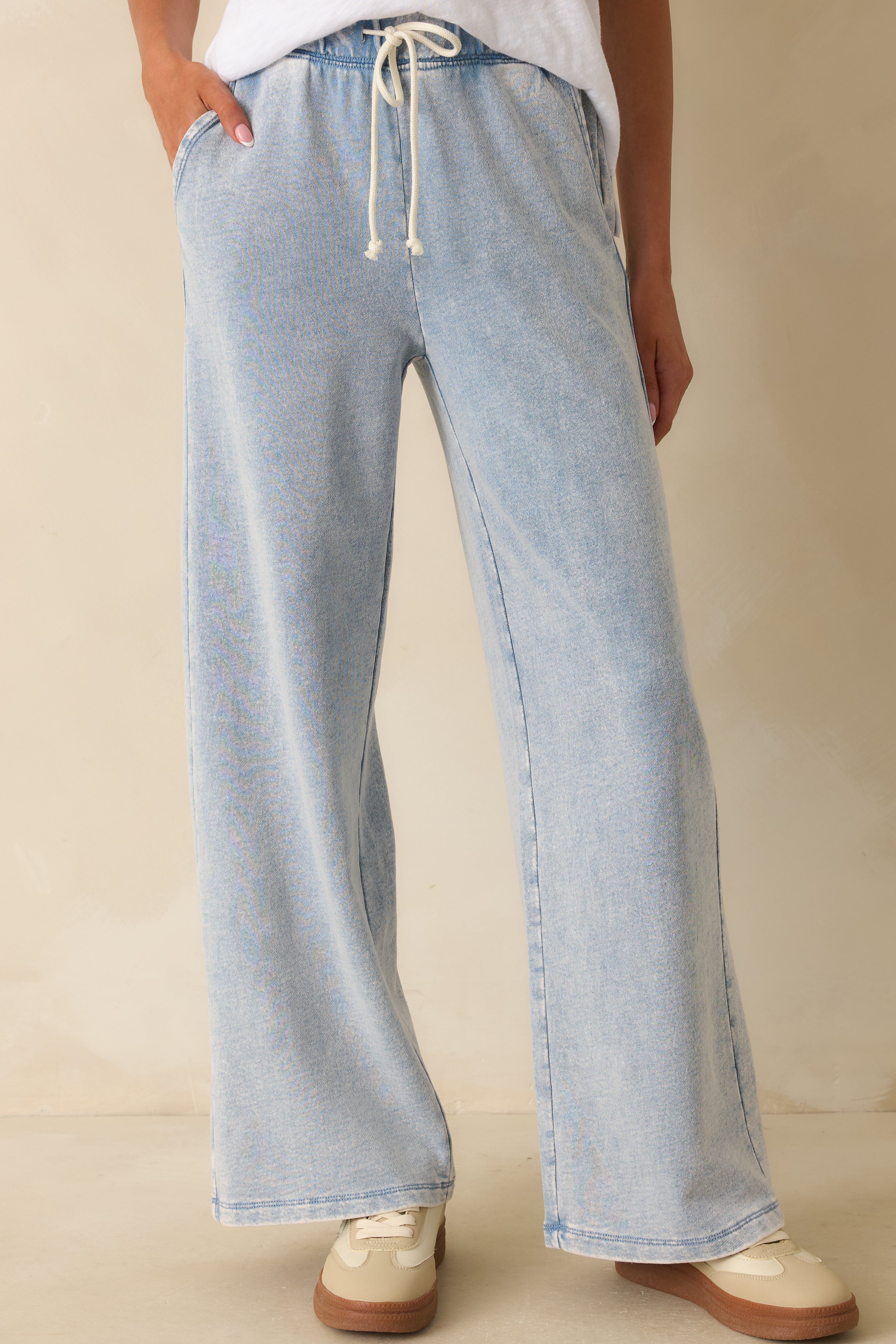 Pants showing the drawstring tie detail and roomy pocket design.