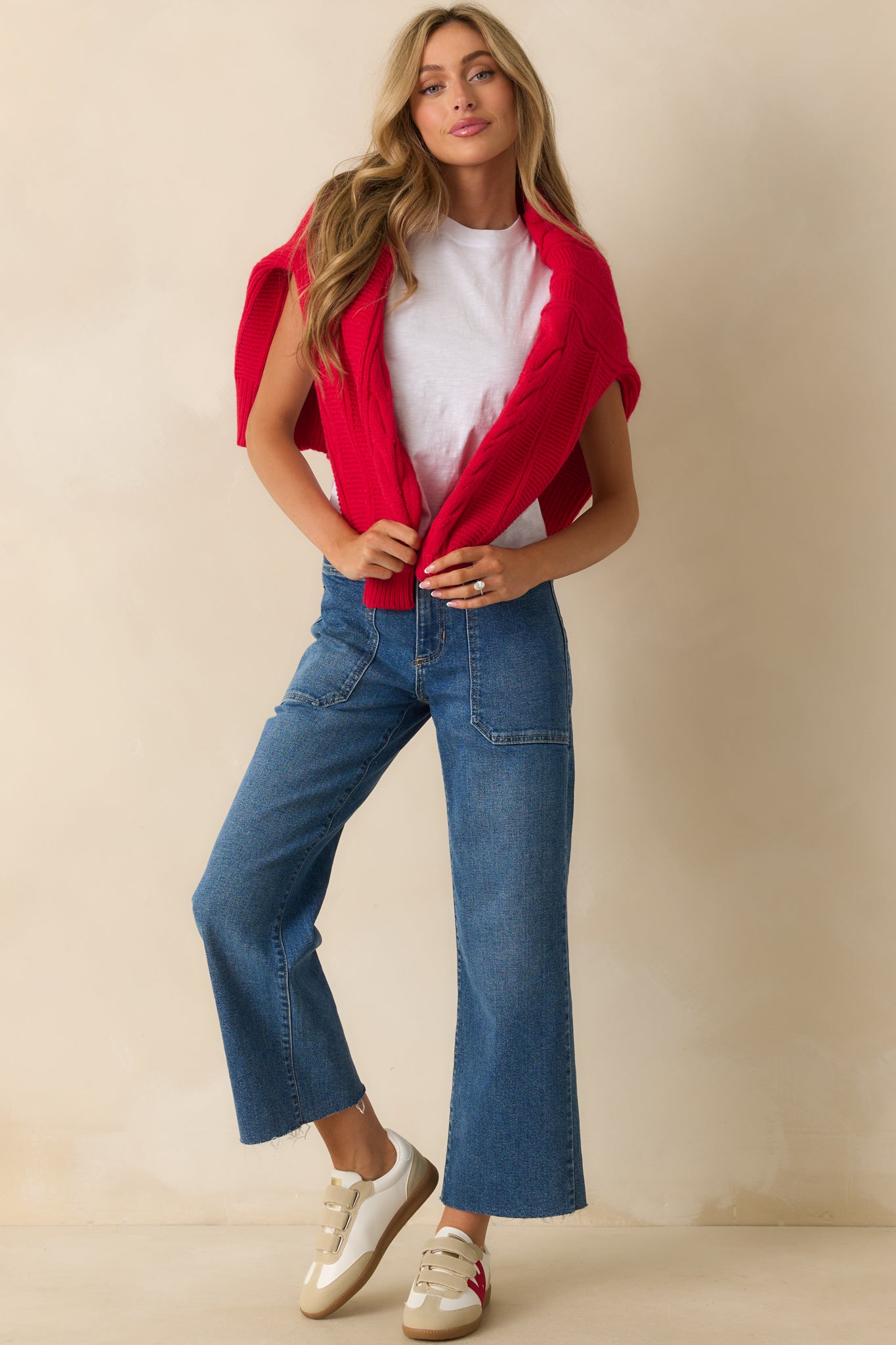 Full body view of white tee with a classic crew neckline, short sleeves, and a lightweight jersey material, shown from the front to display its relaxed fit.