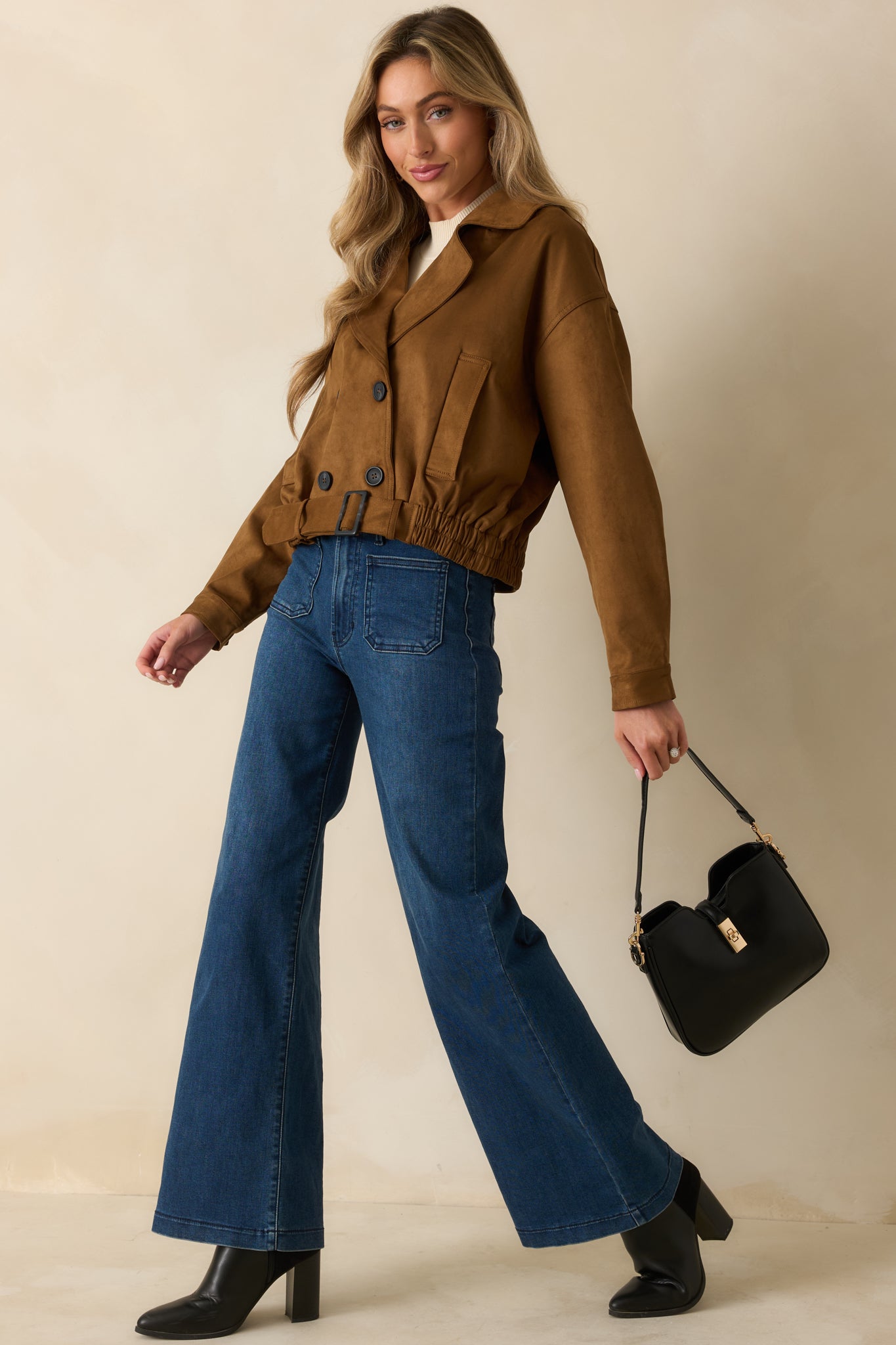 Camel faux suede cropped trench coat with double-breasted button front, wide lapel collar, and belted waist.