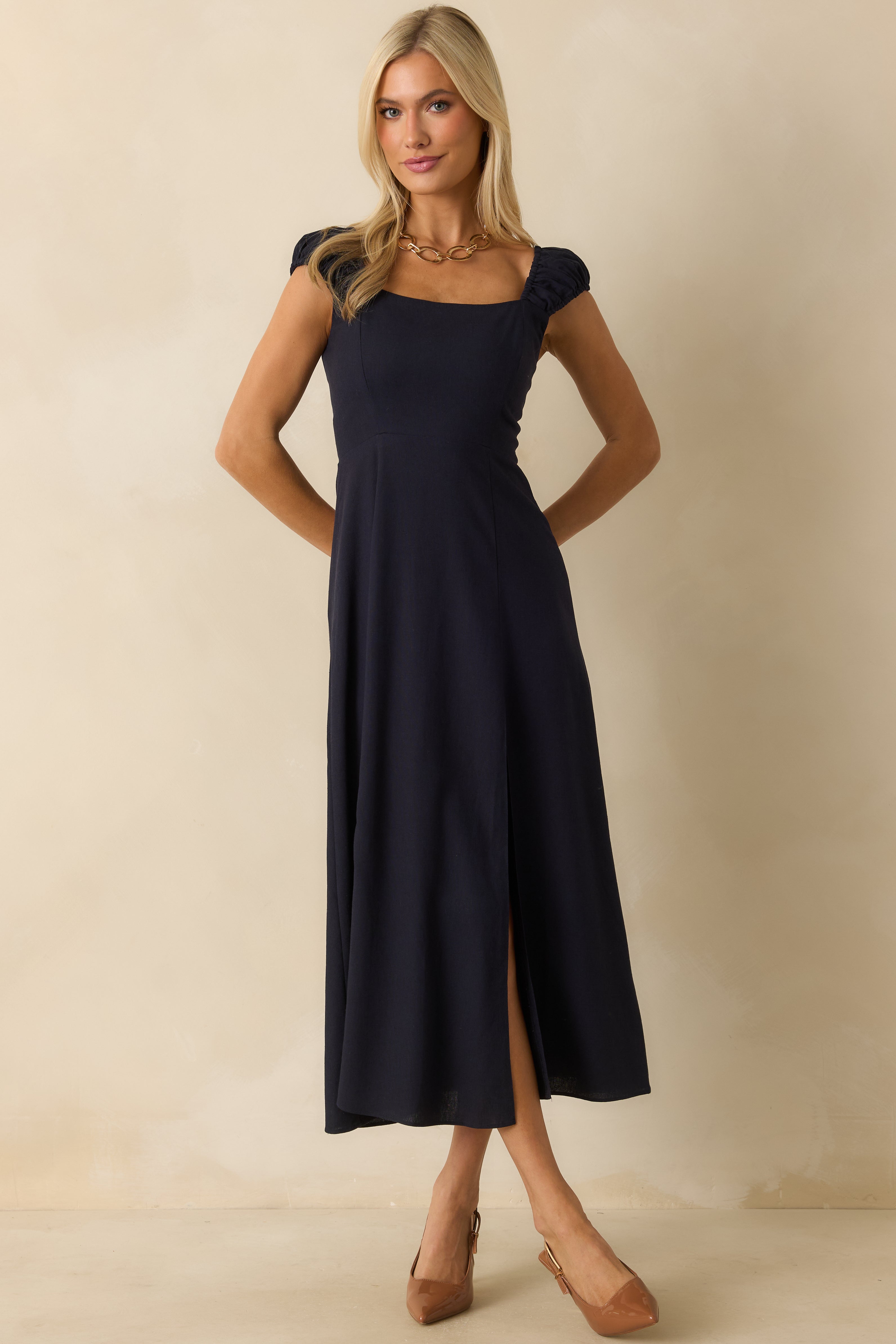 Full front view focusing on the square neckline and overall midi length.