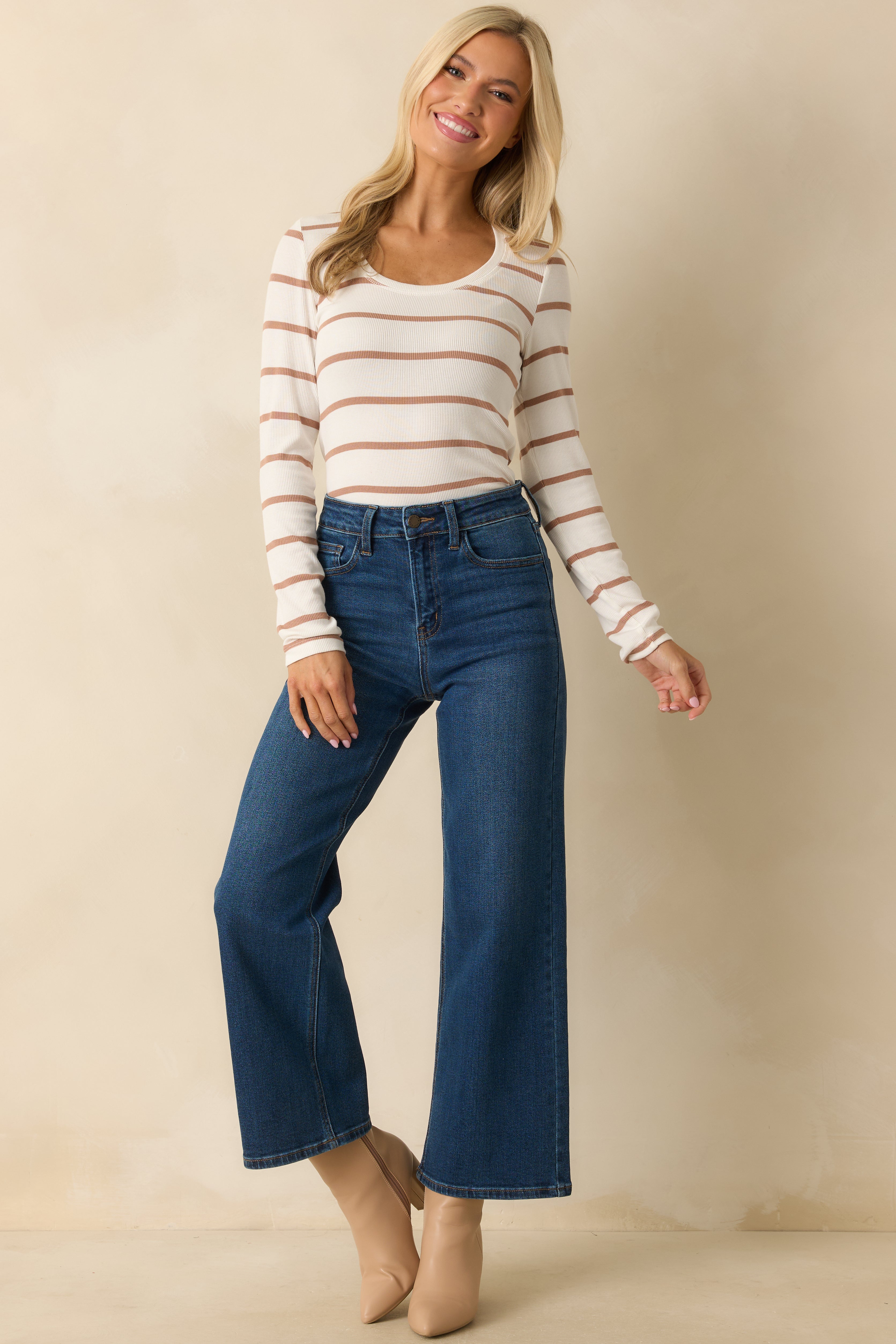 Striped white and caramel top styled with a scoop neck and a subtly fitted shape.