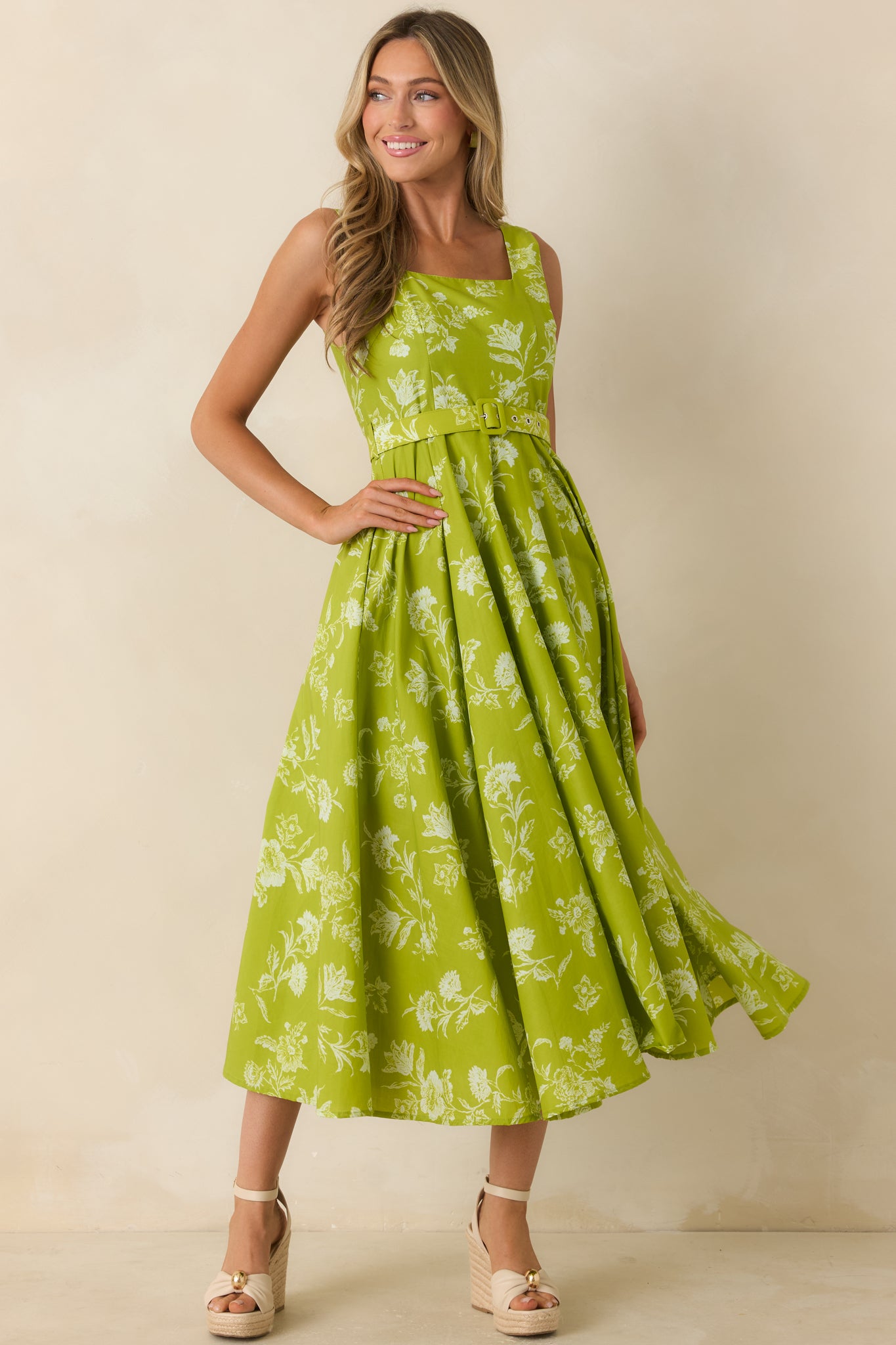 Chartreuse floral midi dress featuring a square neckline, wide shoulder straps, matching adjustable belt, and a full gathered skirt.