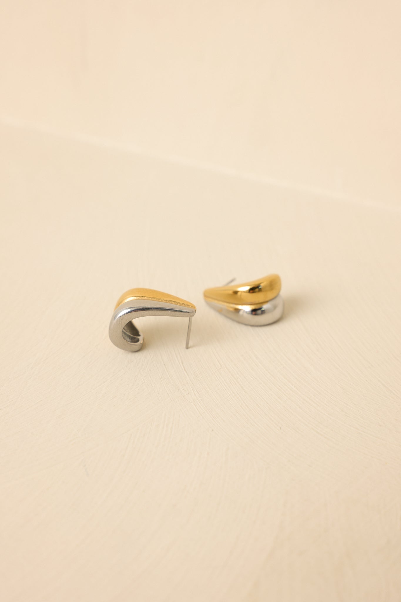 Tight cropped angle focusing on curved sculptural shape and polished surface.